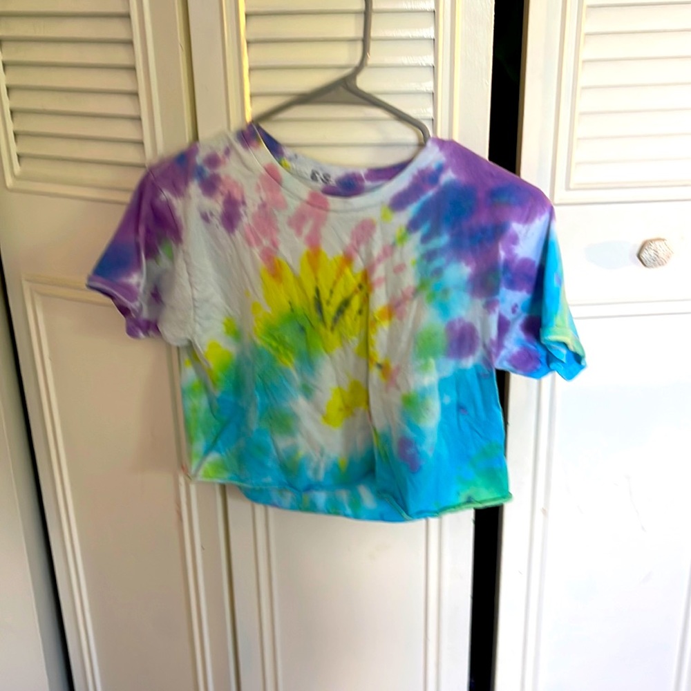 This is a hand made crooked tie dye shirt